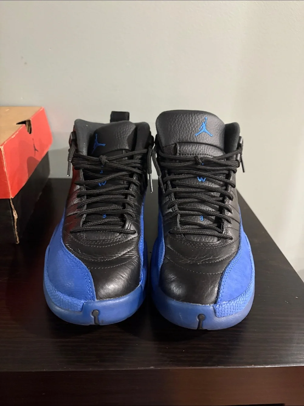 Jordan 12 Retro High Top Sneakers in Black and Royal Blue